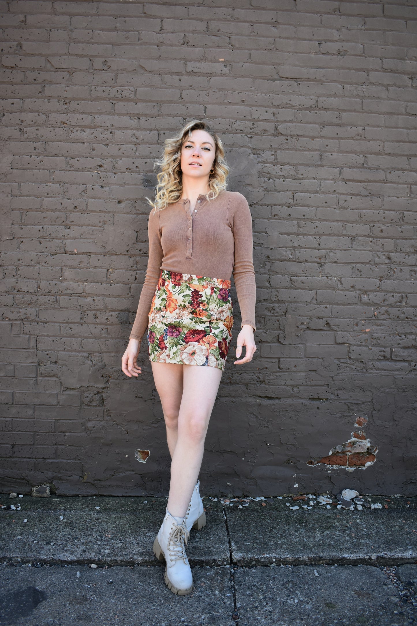 multicolored floral tapestry mini skirt. retro style. taupe background.