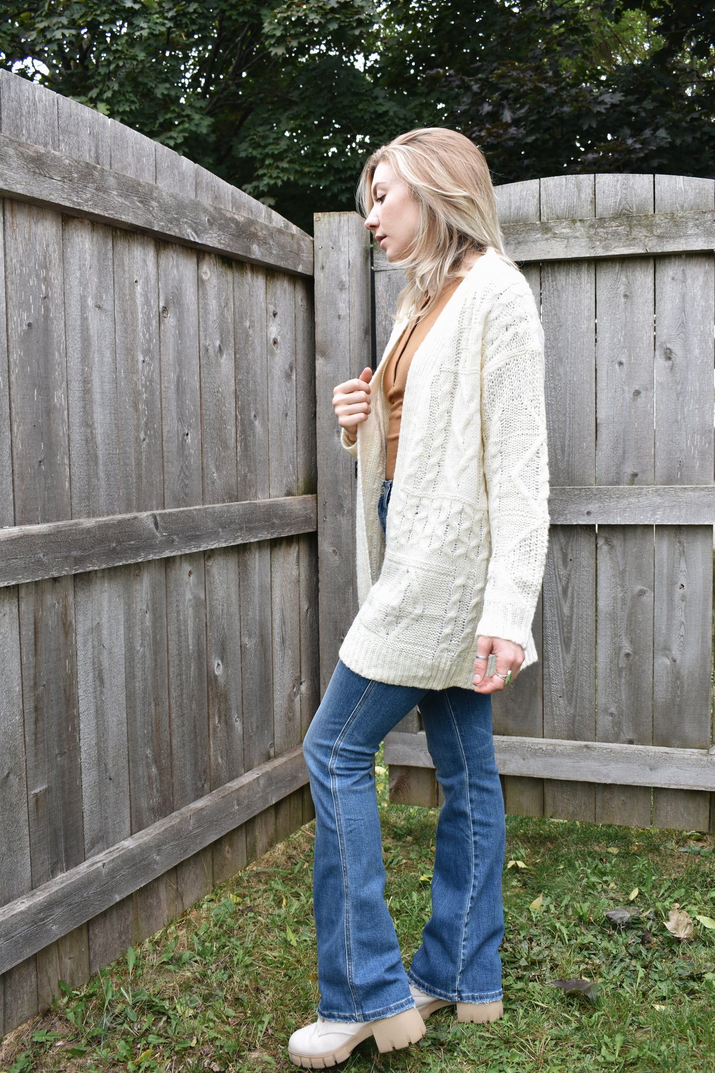 ivory cardigan with mix knit pattern and ribbed cuffs tunic length