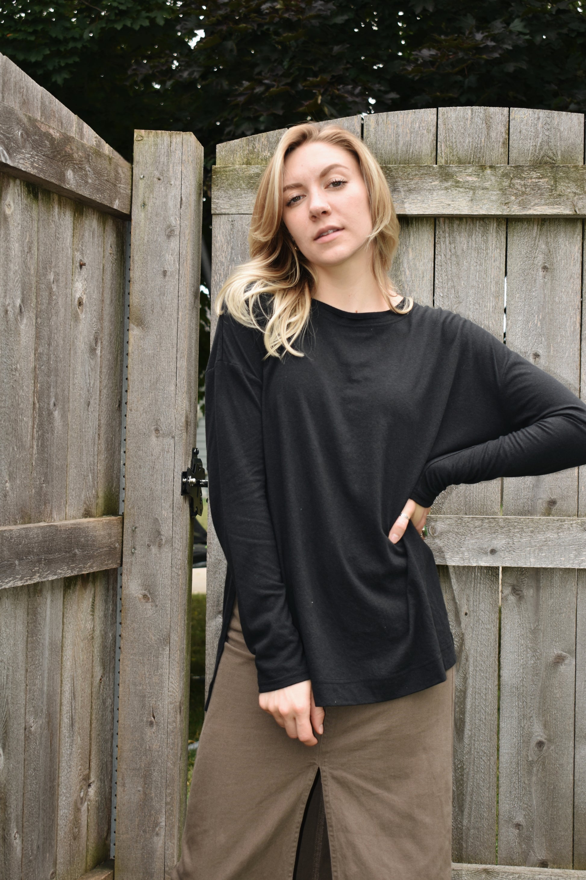 long sleeve loose fitting top with drop shoulders, round neck and splits on the hem on the sides