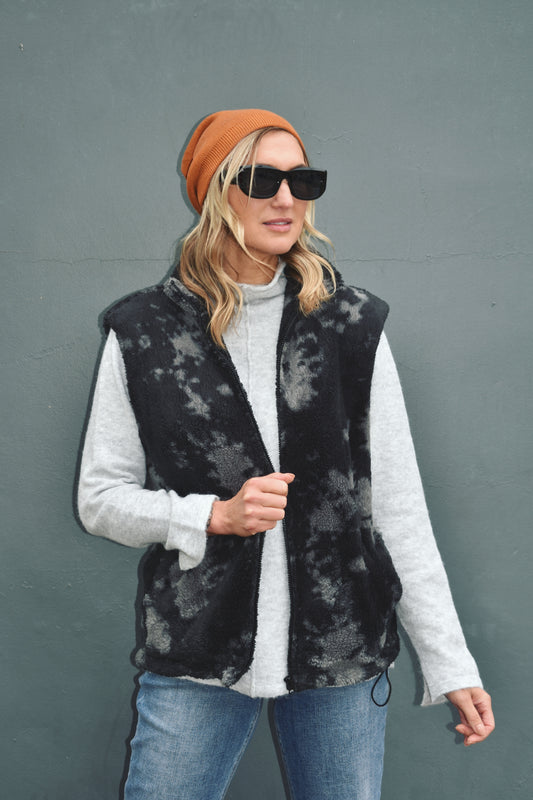 black and gray blot pattern sherpa vest full length high collar oversized fit adjustable bungee at the hem