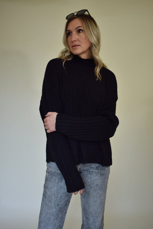 slightly oversized ribbed sweater with mock neck and drop shoulders