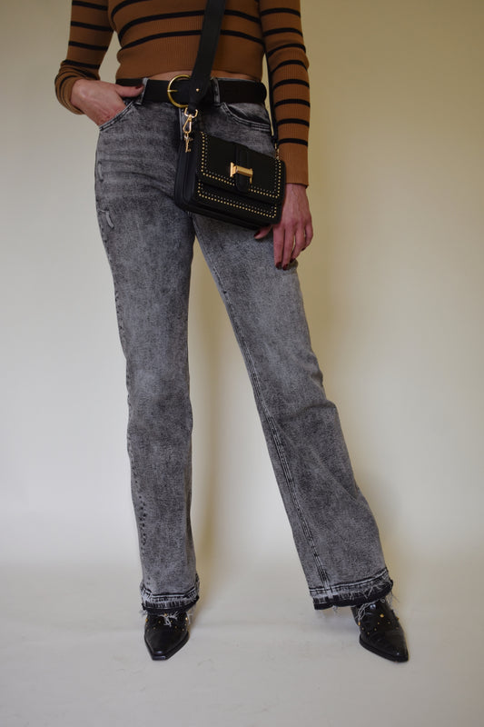 flared stretch denim jeans with gray and black acid wash high rise