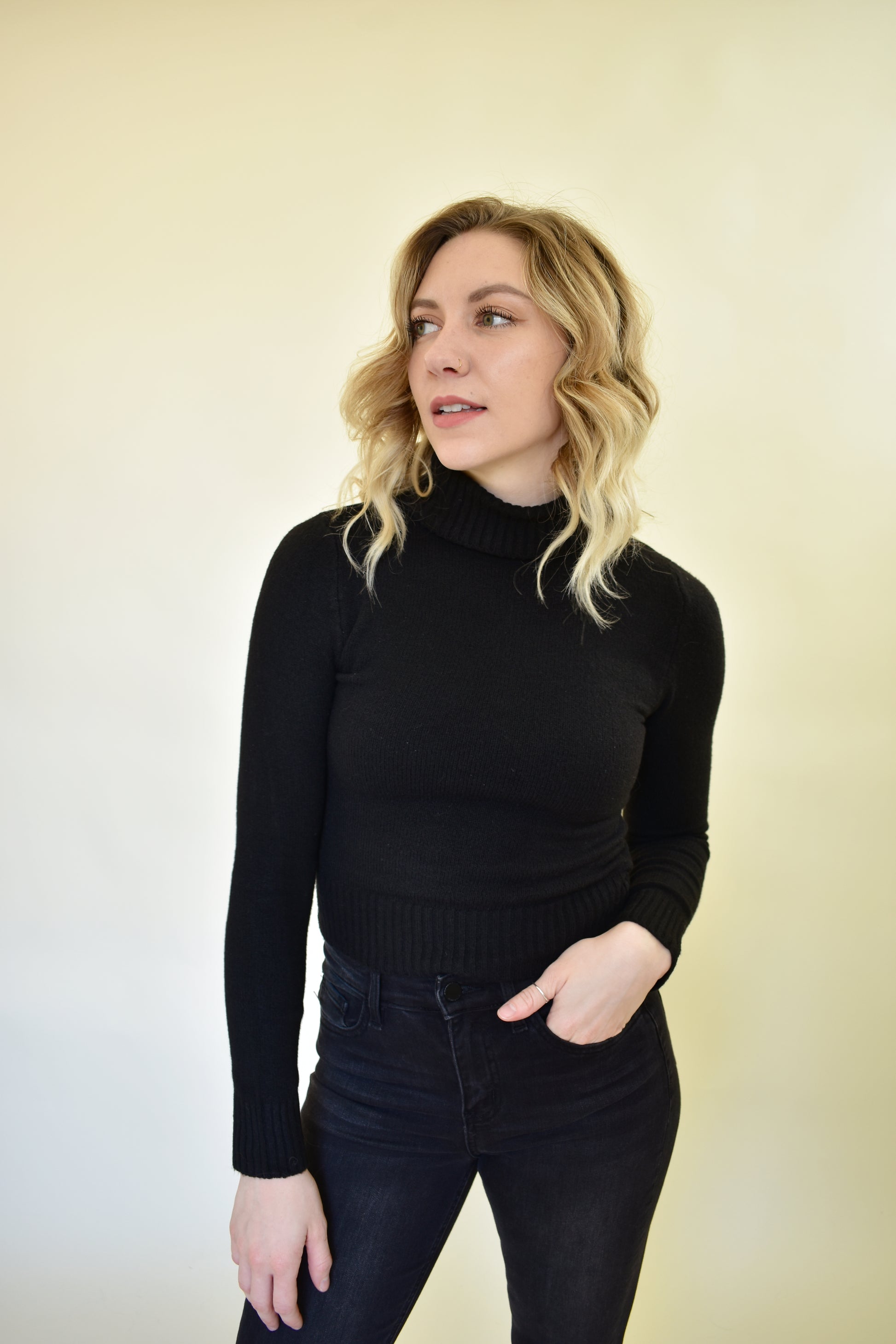 black turtleneck fitted sweater with thick ribbed hem and cuffs 