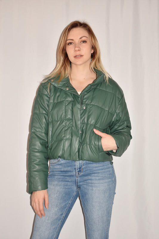 faux leather stone green puffer with collar and side pockets. zip front with snaps, full length.