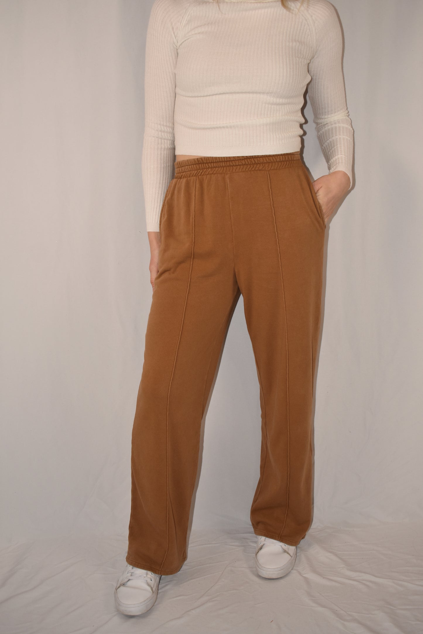 pin tuck sweatpants, straight leg, full length, side pockets, stretchy waist band, no tie. 