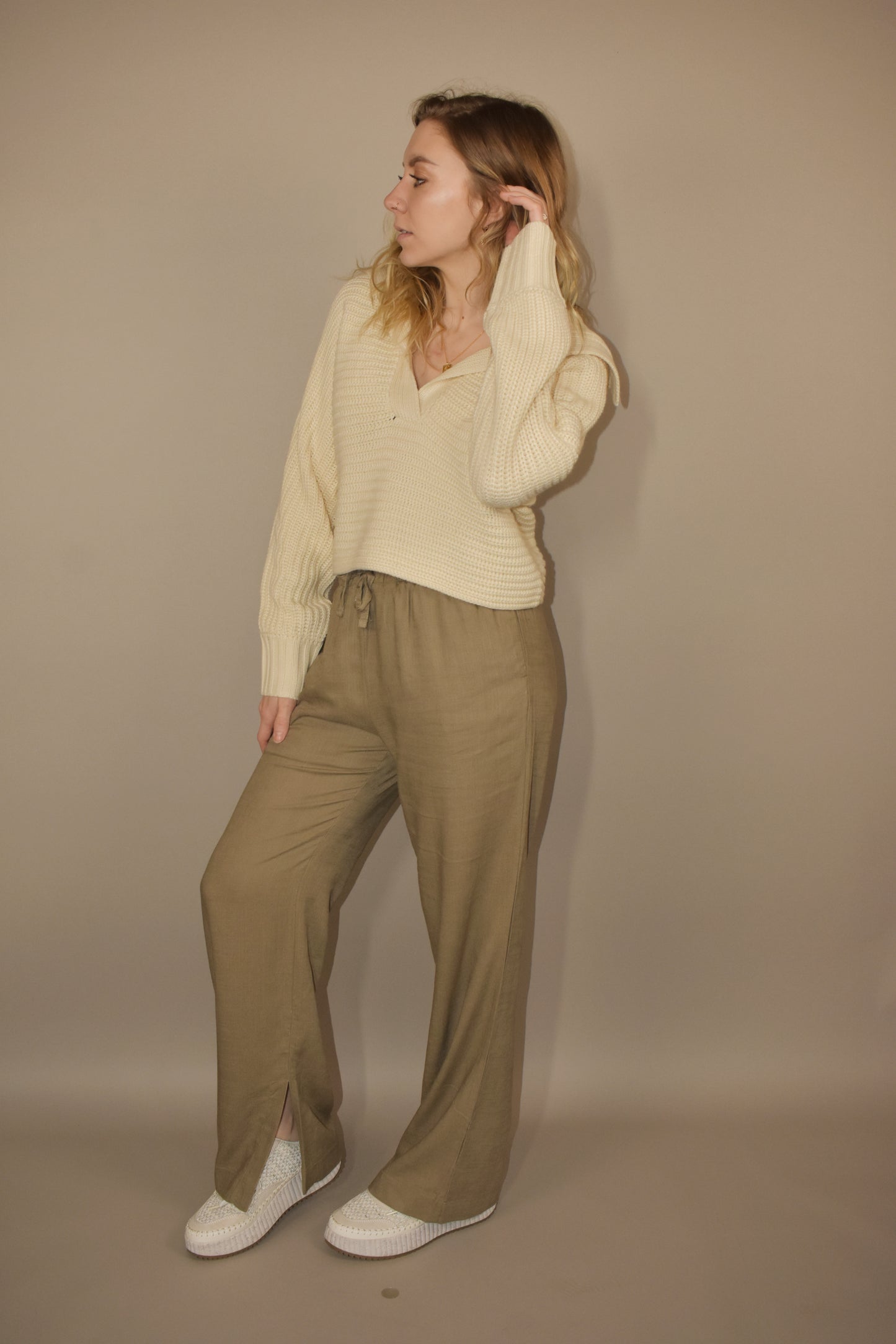 straight leg relaxed resort pants with a lettuce top with a drawstring, side pockets, shorts lining on the inside.