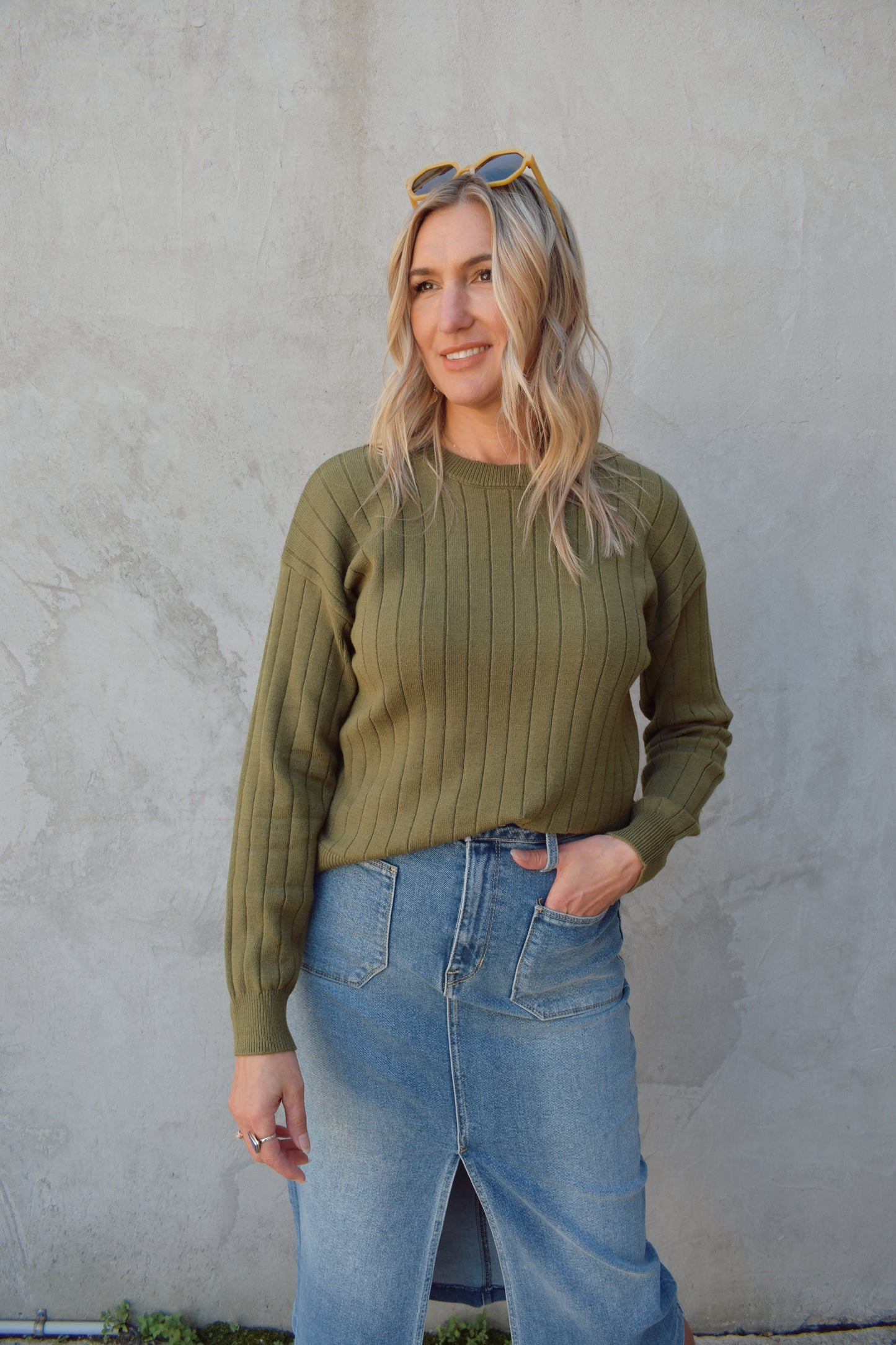 lightweight ribbed crewneck sweater. ribs are vertical, full length, drop shoulders.