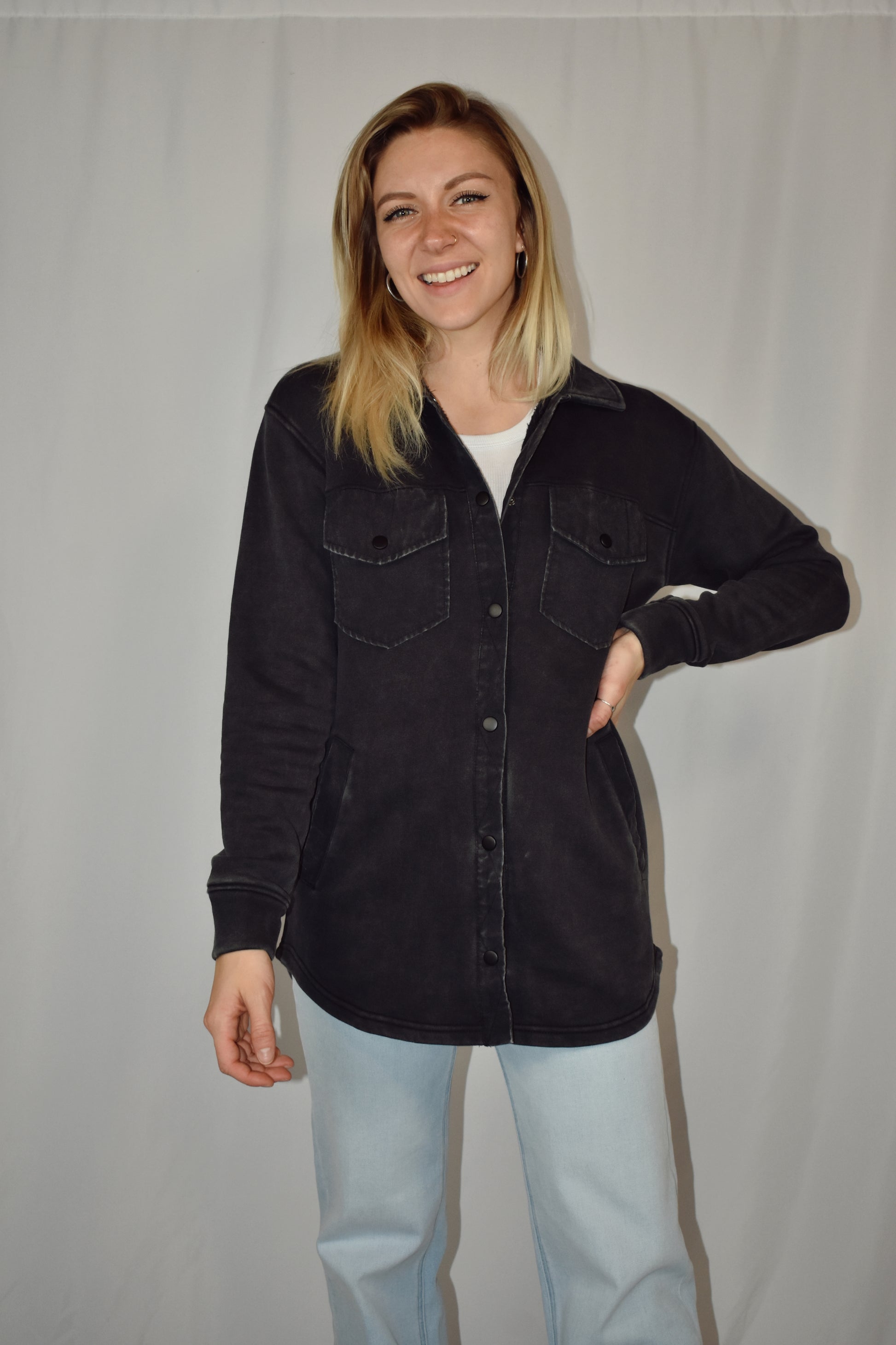 snap button down cozy shacket with two breast pockets, longline silhouette and slightly oversized fit.