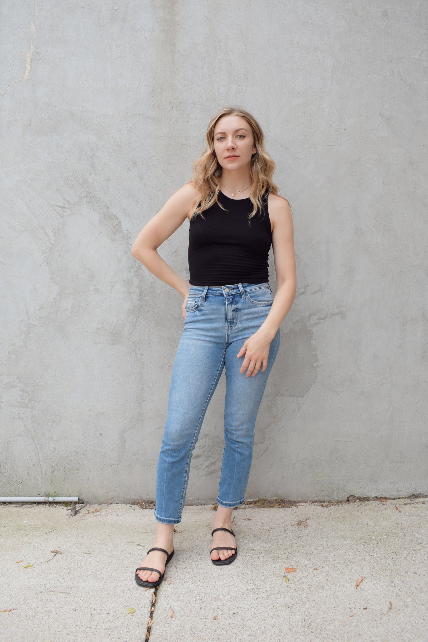 light wash stretch denim slim straight jeans no holes zip and button enclosure high rise