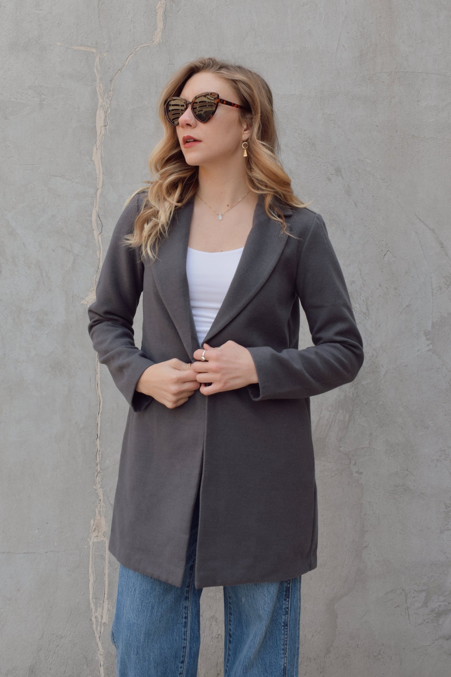 single button over coat peacoat thick felt fabric - fitted style hits mid thigh, side pockets, notched collar.