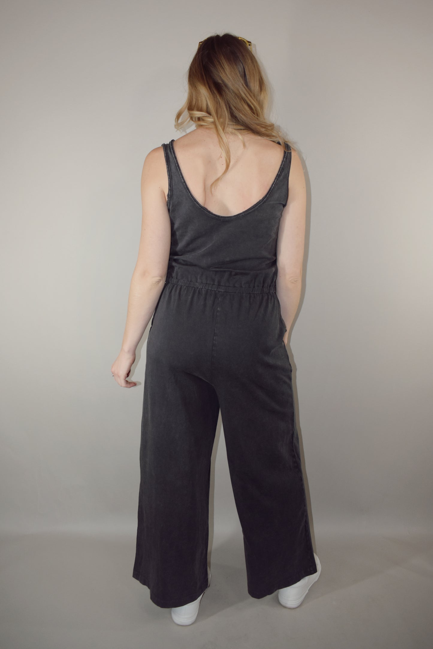 cotton tank jumpsuit scoop neck drawstring waistband deep front pockets wide leg full length low scoop back no back pockets loungewear