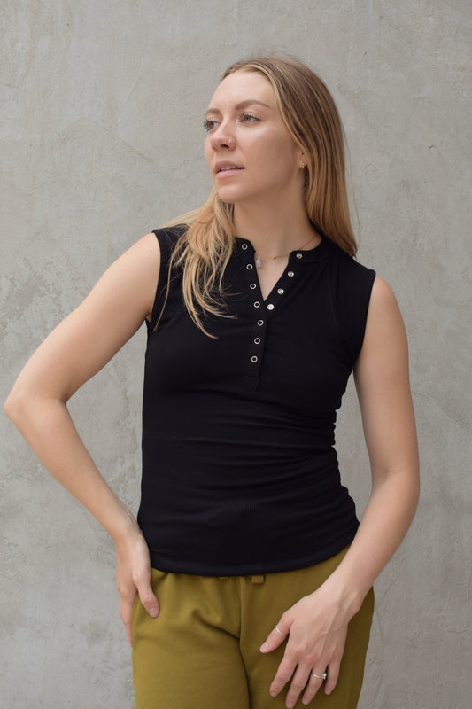 super stretch henley tank top full length with snaps and has exposed seams athleisure fitted