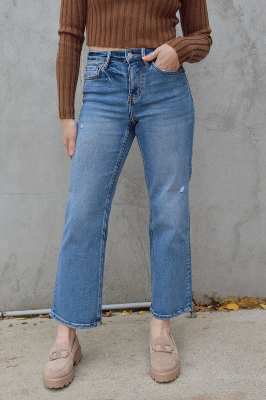 slim wide leg jeans cropped high rise medium wash light distressing marks but no holes stretch denim