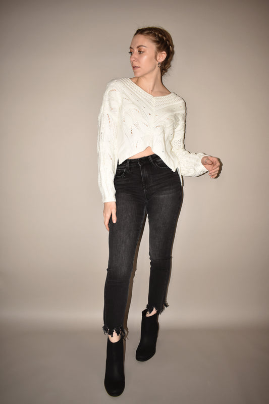 cable knit cropped white sweater with beautiful v neck detailing and the hem is an upward v - sides have a slight slit