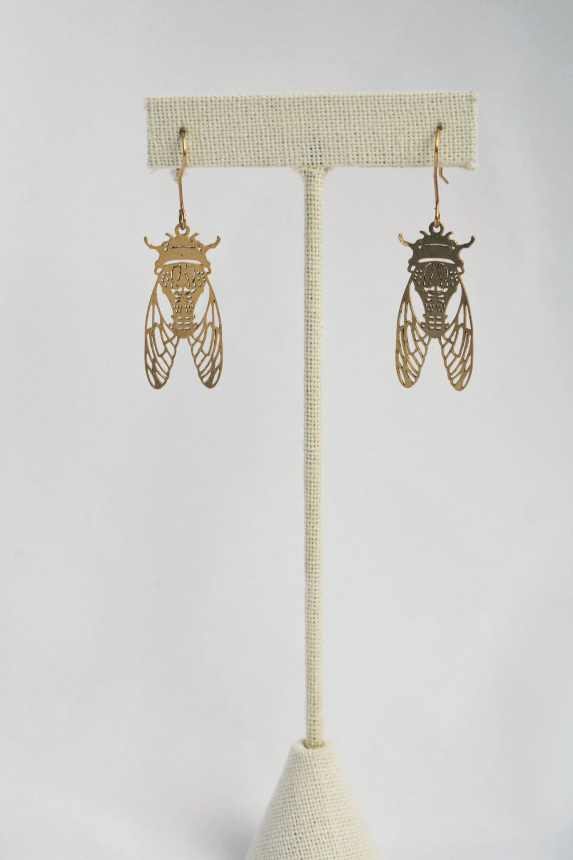 raw brass moth flora and fauna statement earrings