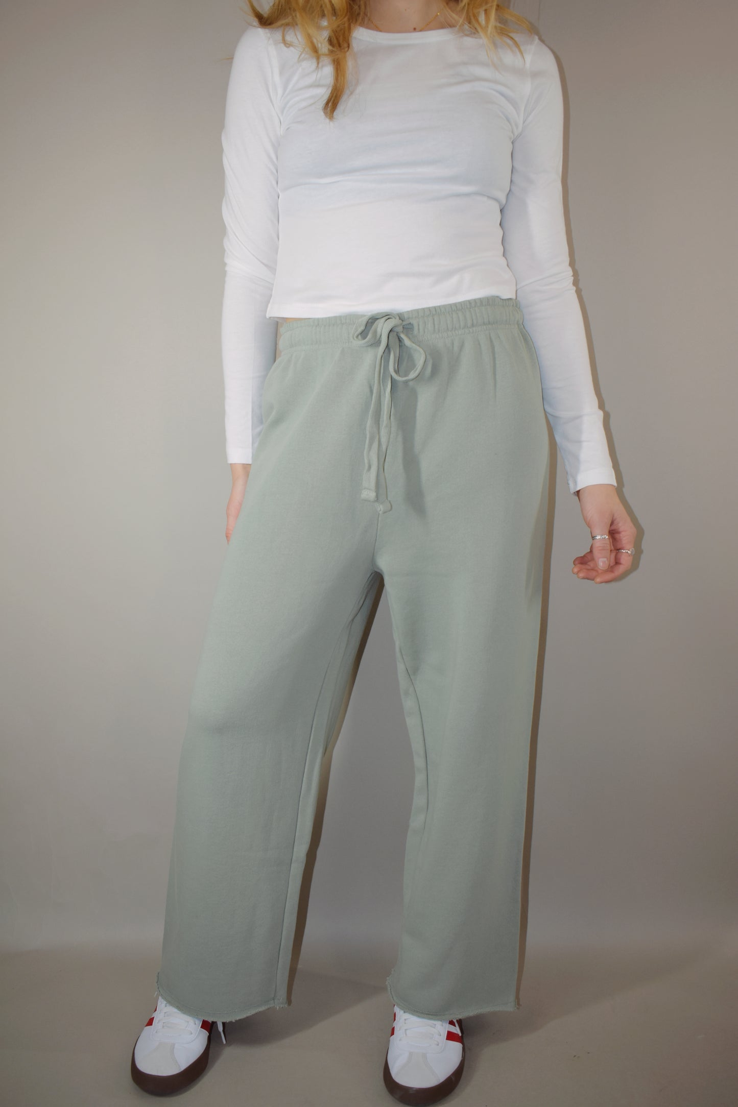 wide leg 100% cotton sweatpants with drawstring and elastic waistband raw hem no pockets athleisure