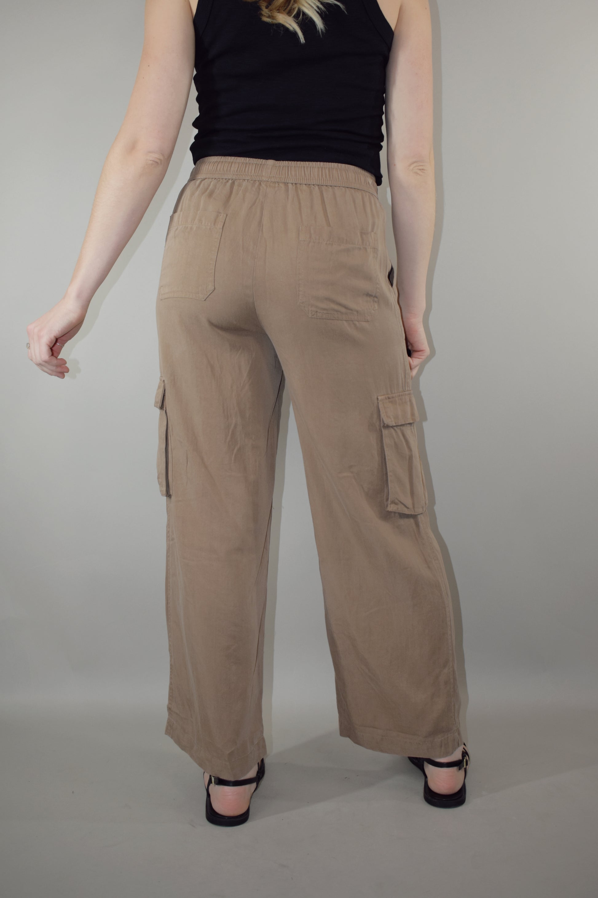 tencel cargo pants with slight wide leg elastic waistband with drawstring side pockets and side cargo pockets patch back pockets