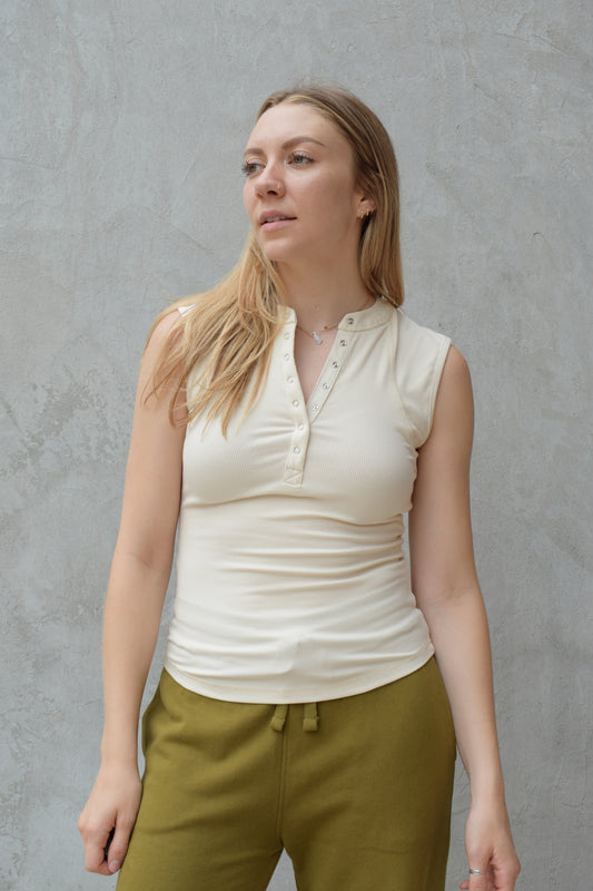super stretch henley tank top full length with snaps and has exposed seams athleisure fitted