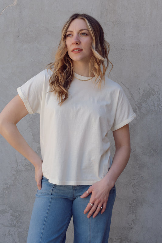 full length relaxed fit crew neck tee with slight cuff and super soft cotton fabric slight high low hem and seam detail down the middle on the back
