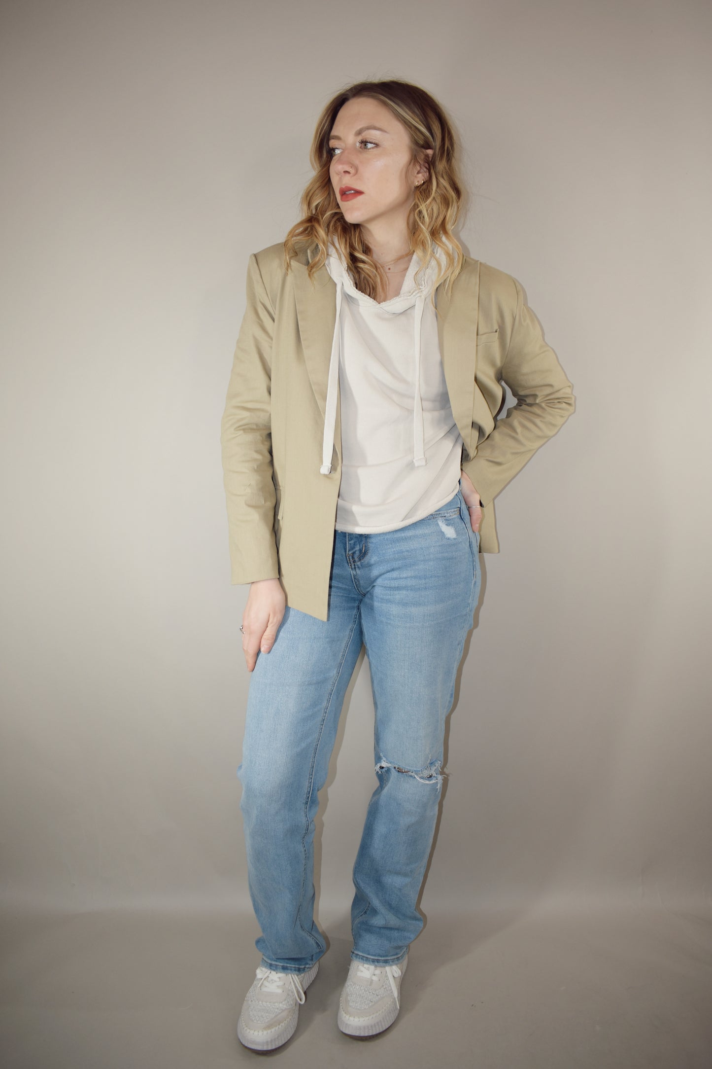 nude linen blazer full length front pockets with flap enclosure single button enclosure slit in back hemline relaxed shoulder pad structure