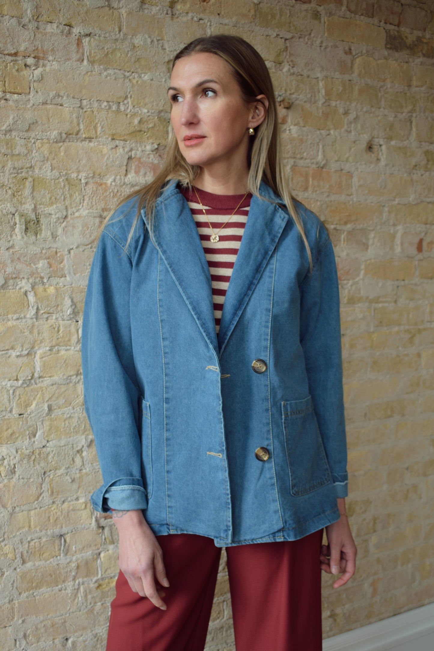 medium/light wash denim blazer jacket with front patch pockets and two button enclosure relaxed fit full length
