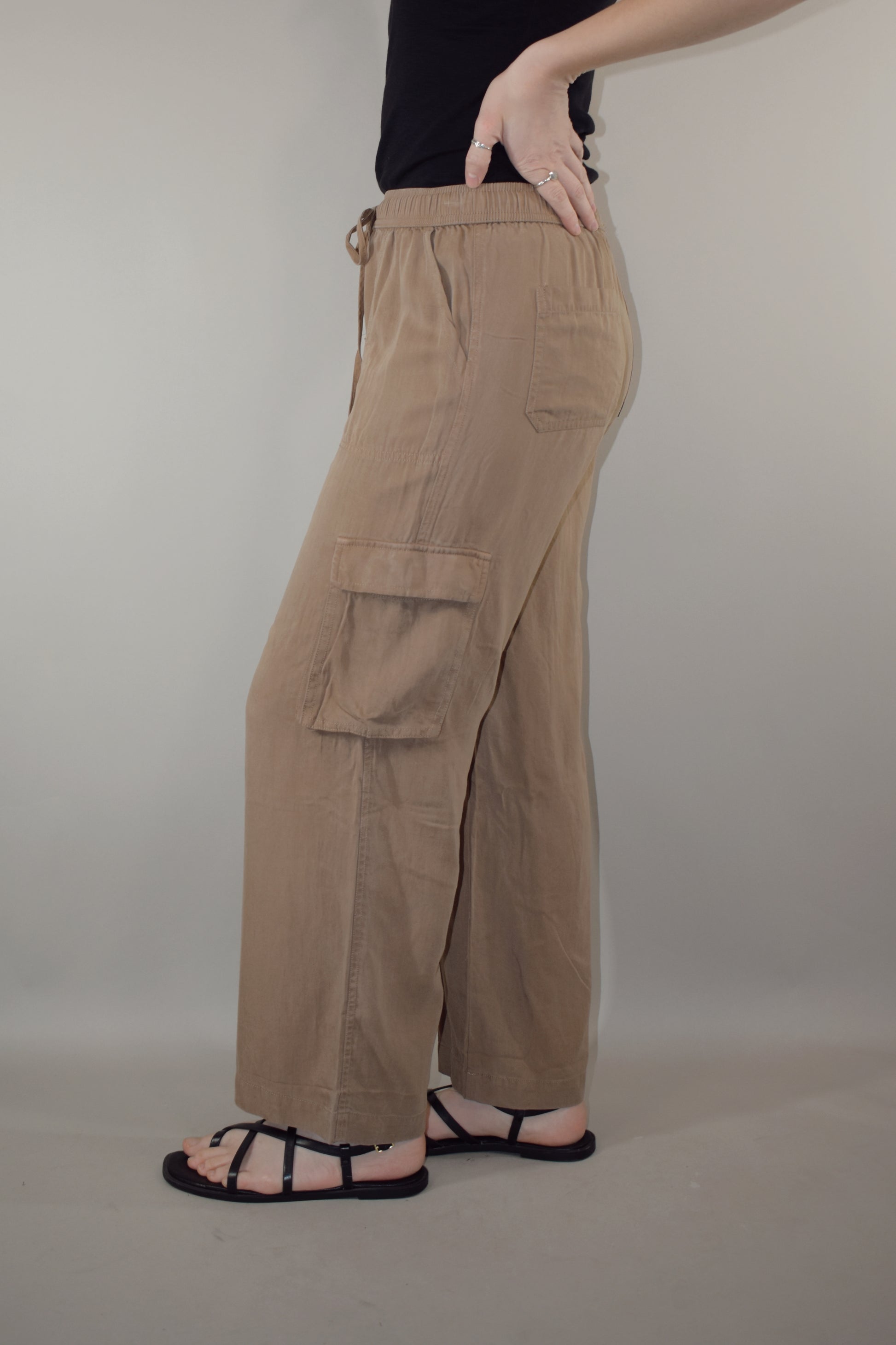 tencel cargo pants with slight wide leg elastic waistband with drawstring side pockets and side cargo pockets patch back pockets