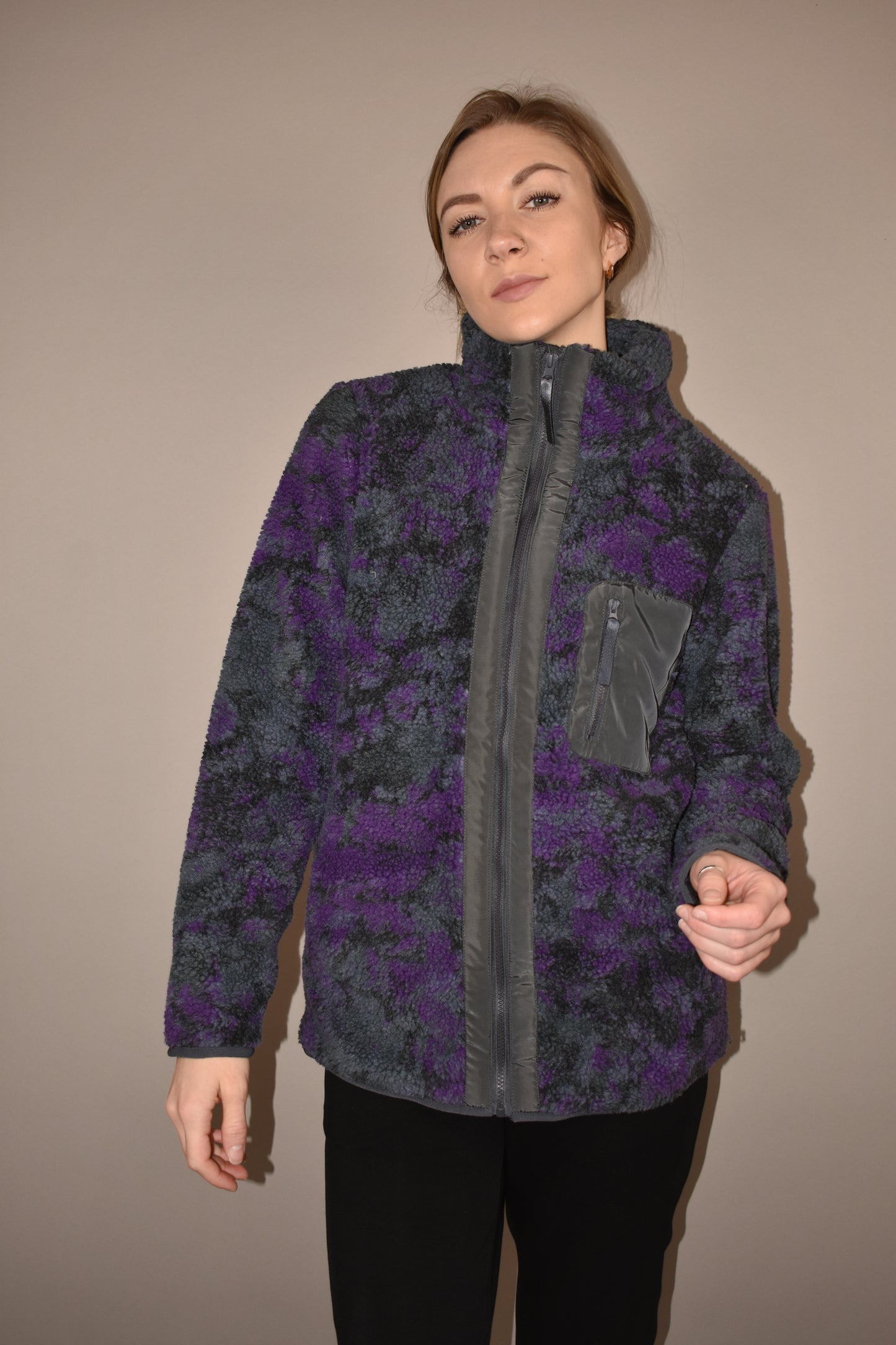 purple, black and gray tie dye full front zip sherpa jacket with one zip breast pocket and side pockets. zips up to a turtleneck and full length.