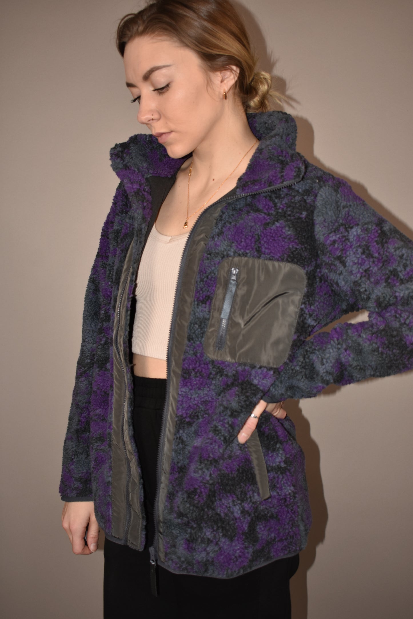 purple, black and gray tie dye full front zip sherpa jacket with one zip breast pocket and side pockets. zips up to a turtleneck and full length.