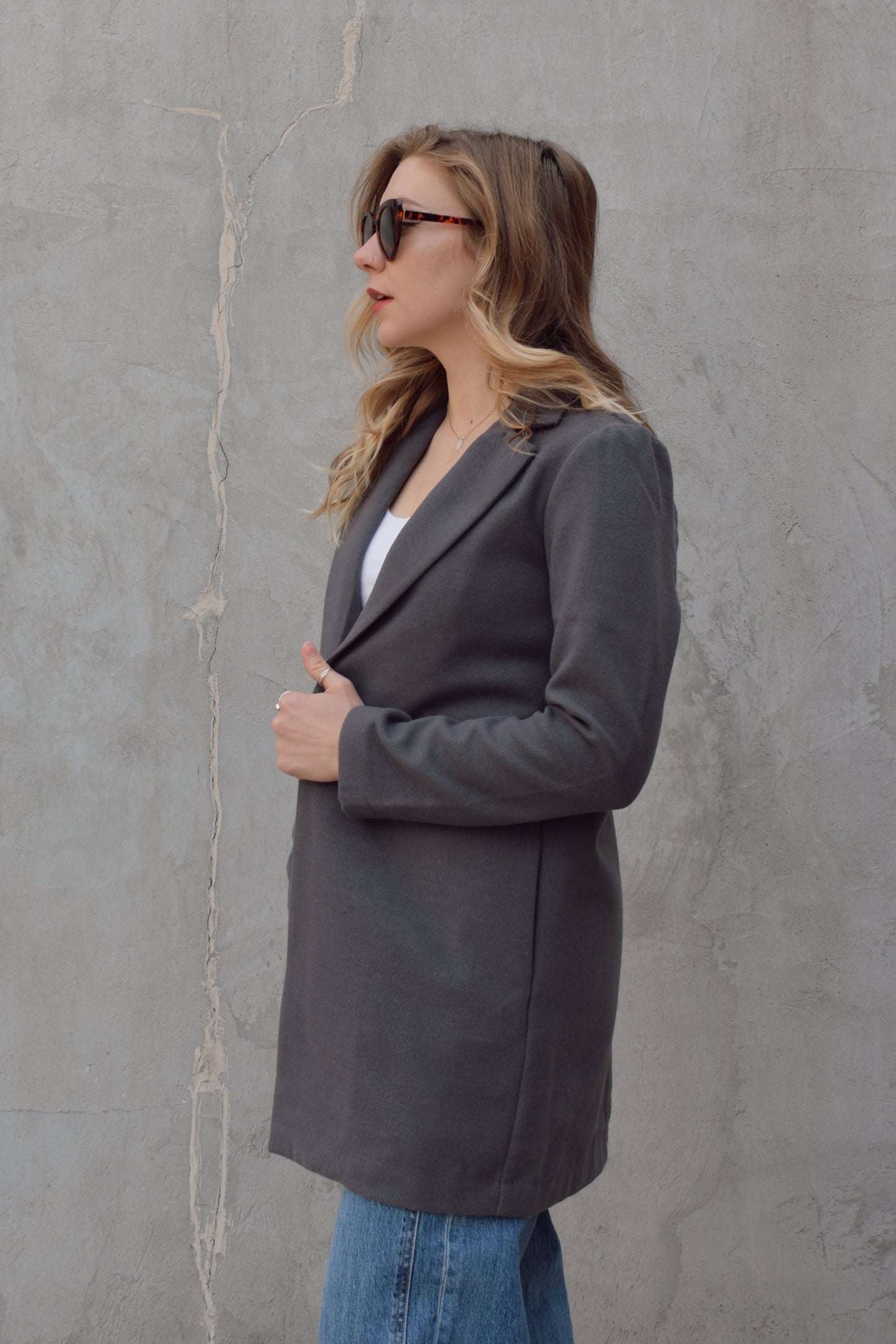 single button over coat peacoat thick felt fabric - fitted style hits mid thigh, side pockets, notched collar.