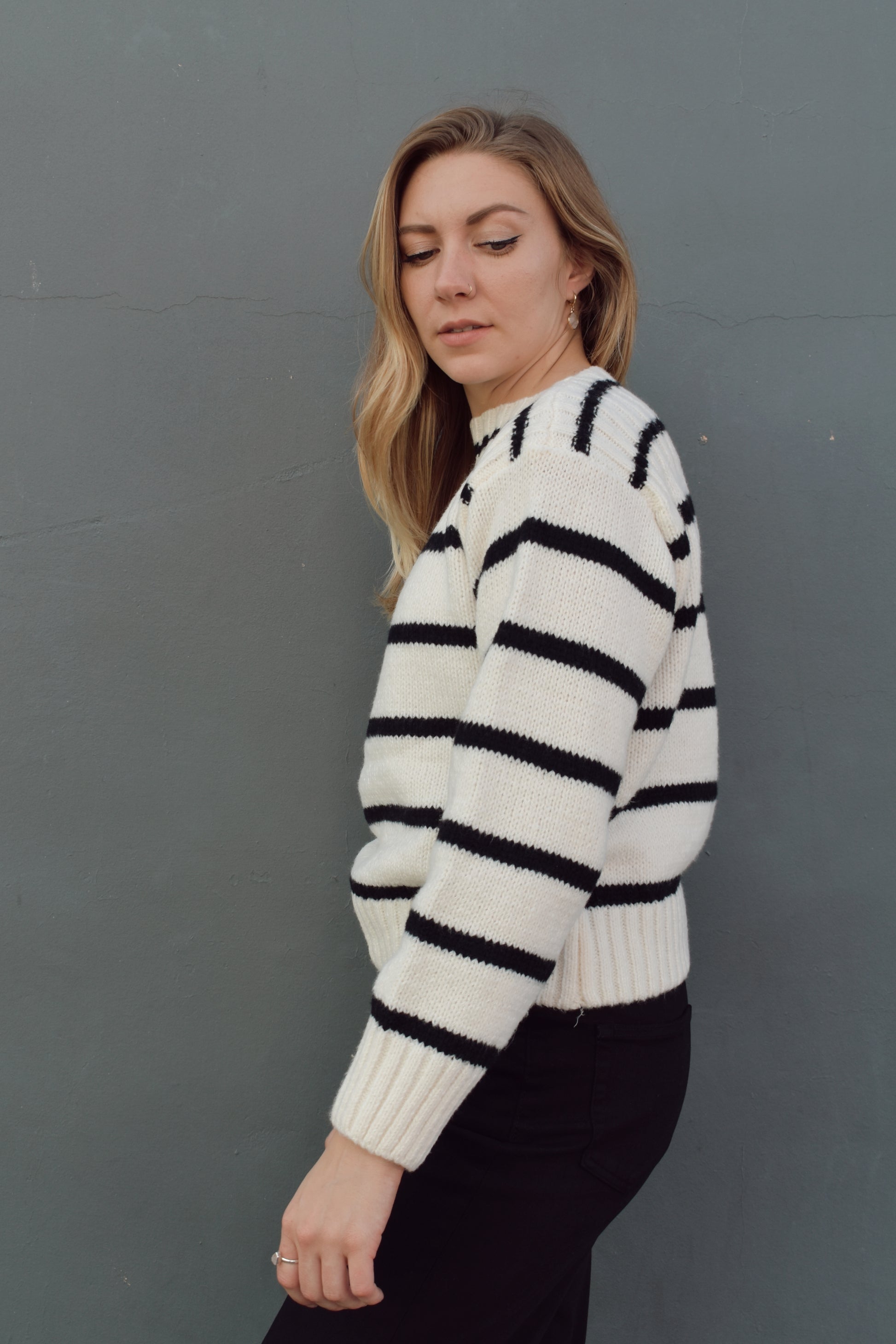 full length striped sweater with boat neck and ribbed detailing on neckline, hem and cuffs. horizontal stripes