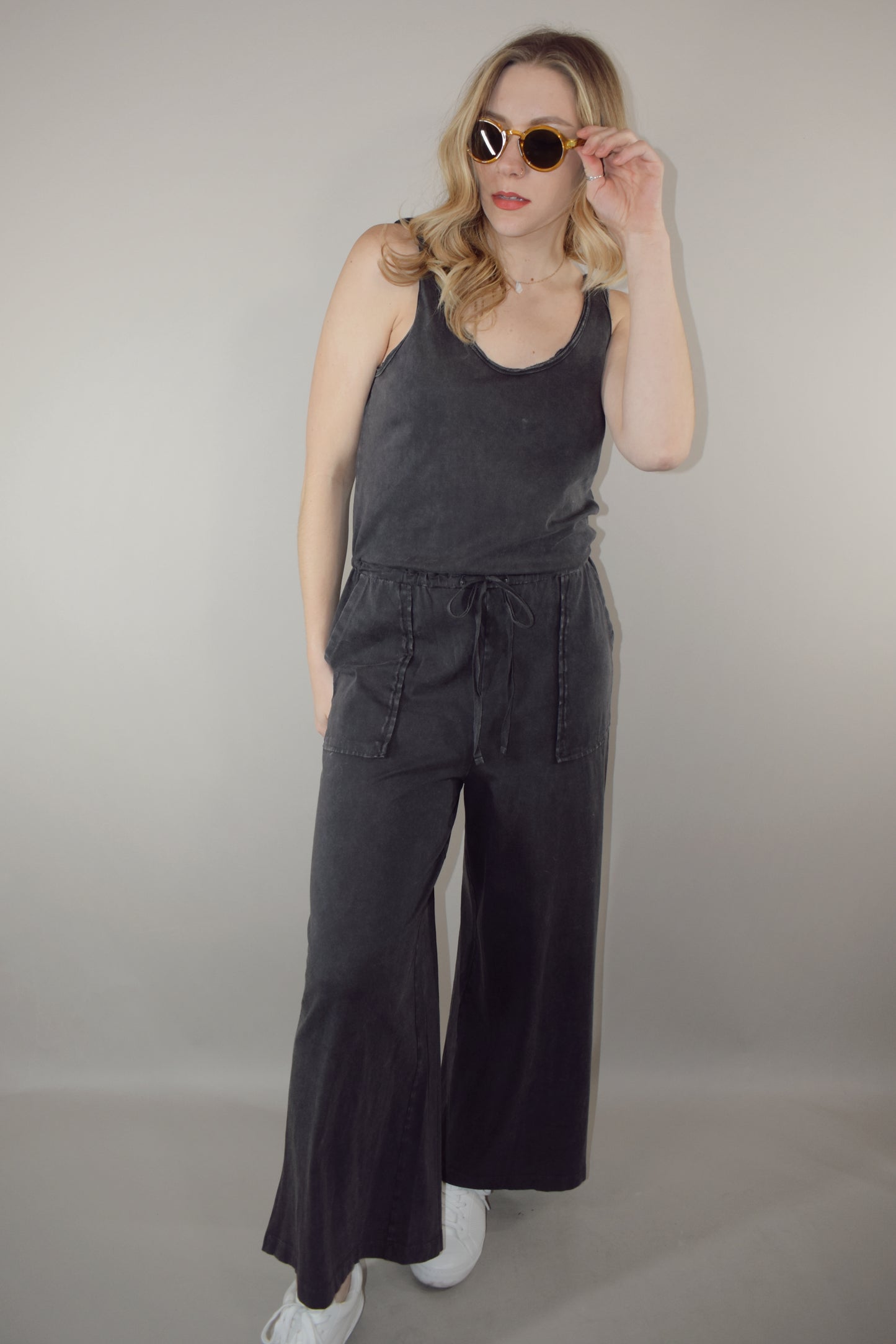 cotton tank jumpsuit scoop neck drawstring waistband deep front pockets wide leg full length low scoop back no back pockets loungewear