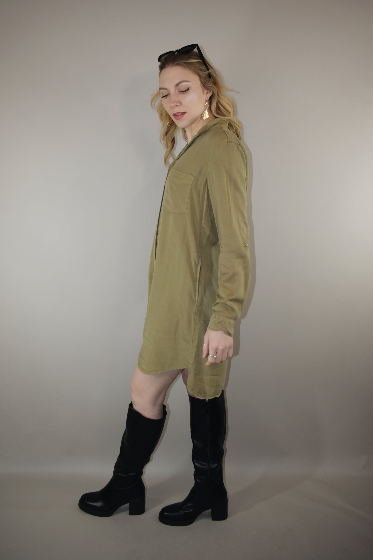 olive tencel button down collared mini dress with long sleeves with cuff option and one patch breast pocket high low hem 