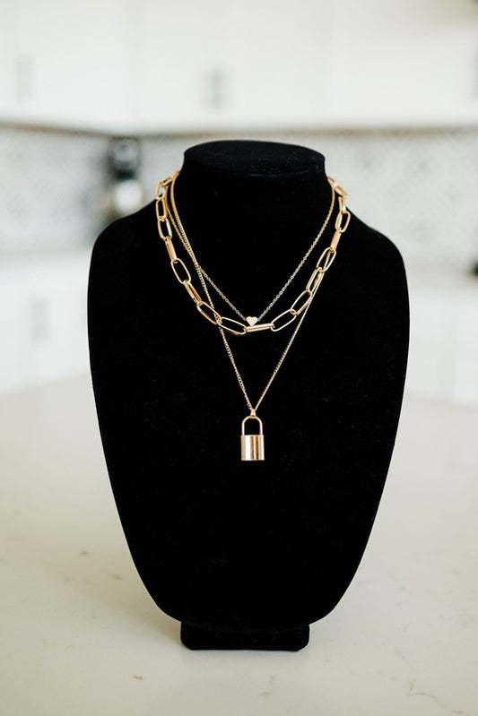 layered lock chain necklace trend modern & chic the revival boutique
