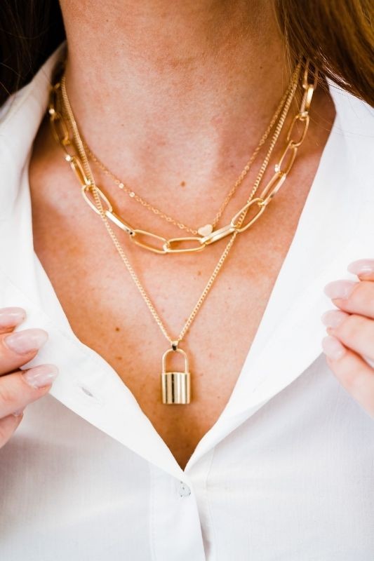 layered lock chain necklace trend modern & chic the revival boutique
